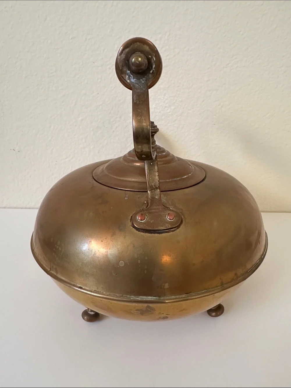 Antique-Inspired Brass Footed Tea Kettle with Amber Glass Handle